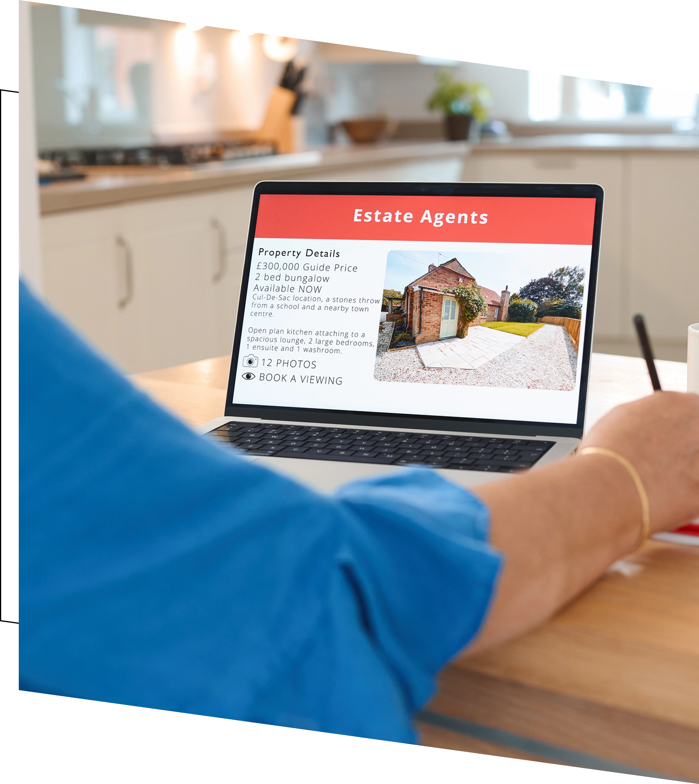 Person browsing real estate listings on laptop.